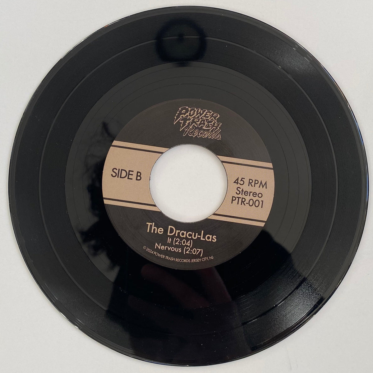 Small vinyl record on a white background